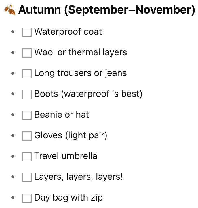 An autumn packing checklist for September to November with a falling leaf emoji in the heading. The list includes: waterproof coat, wool or thermal layers, long trousers or jeans, boots (preferably waterproof), beanie or hat, light gloves, travel umbrella, repeated reminder for "layers, layers, layers!", and a day bag with a zip—each item shown with an empty checkbox.
